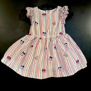 3-6 month Disney dress. Never worn. Pink, white and blue striped with characters